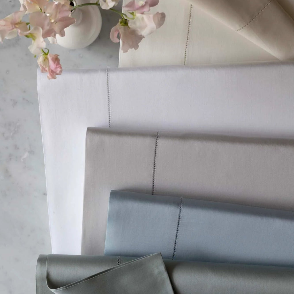 Stresa Sateen Sheets, Duvet Covers + Shams from Scandia Home made from Egyptian cotton in White, Cloud, Heath and Rain