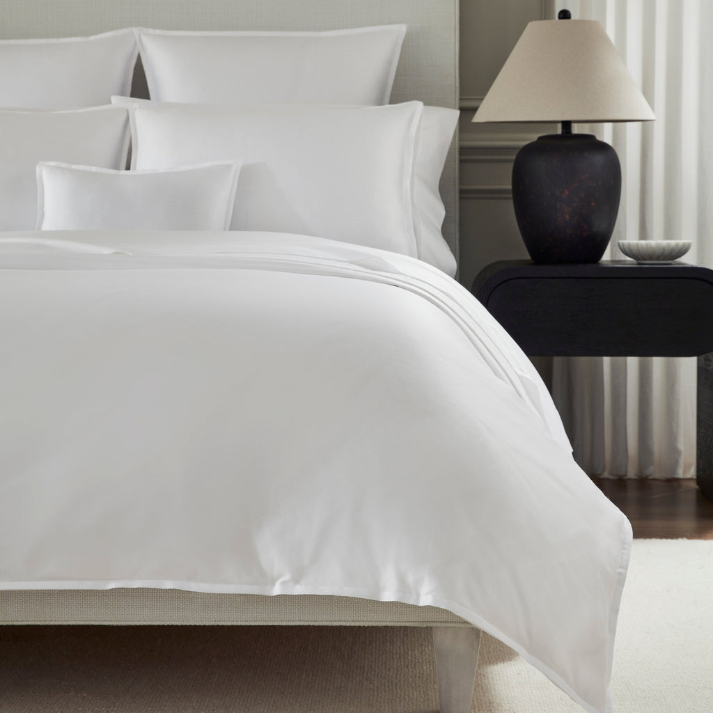 Giza 45 Corto Sateen Duvet Cover, Sheets, and Shams in White from luxury bedding designer Sferra Fine Linens
