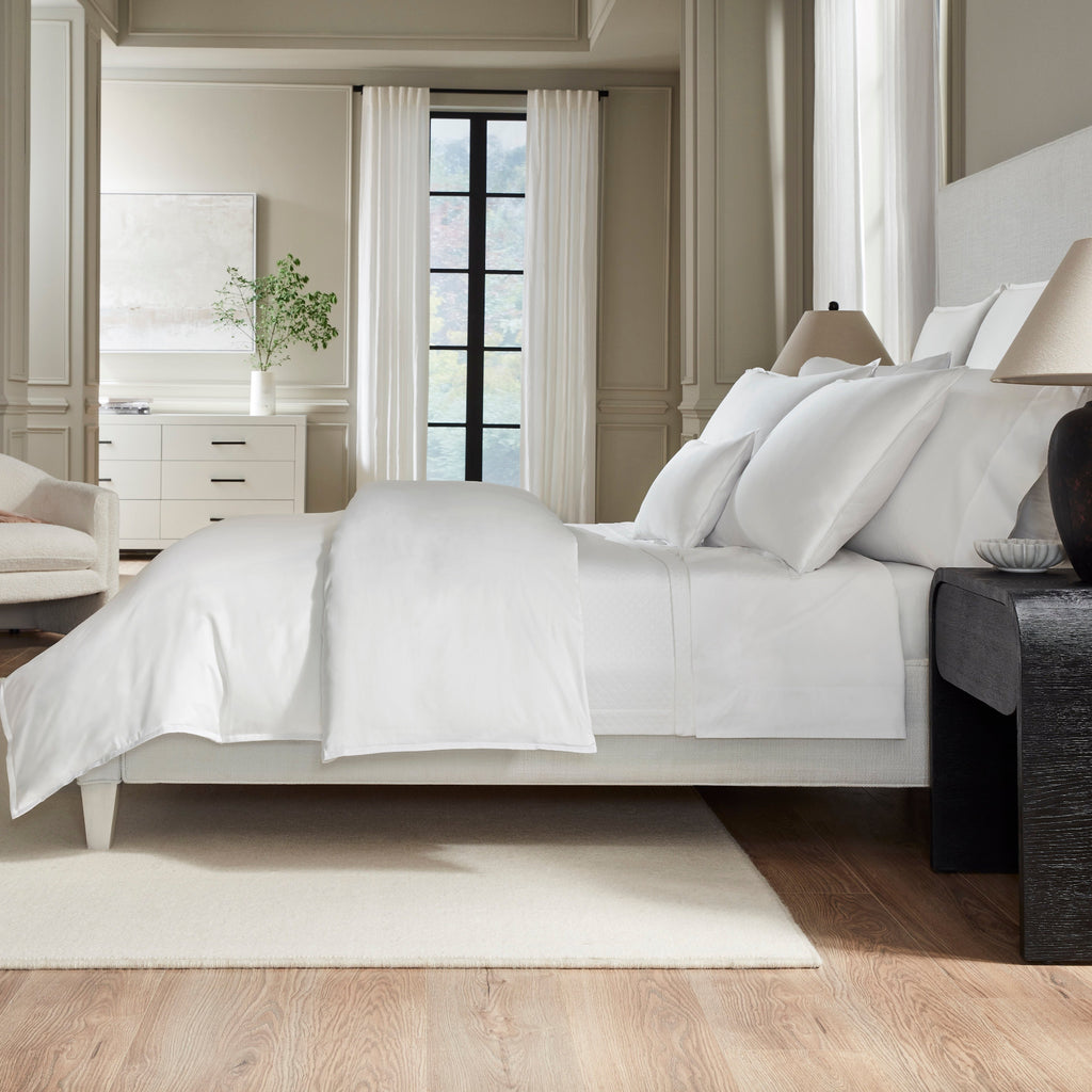 Giza 45 Corto Sateen Duvet Cover, Sheets, and Shams in White from luxury bedding designer Sferra Fine Linens