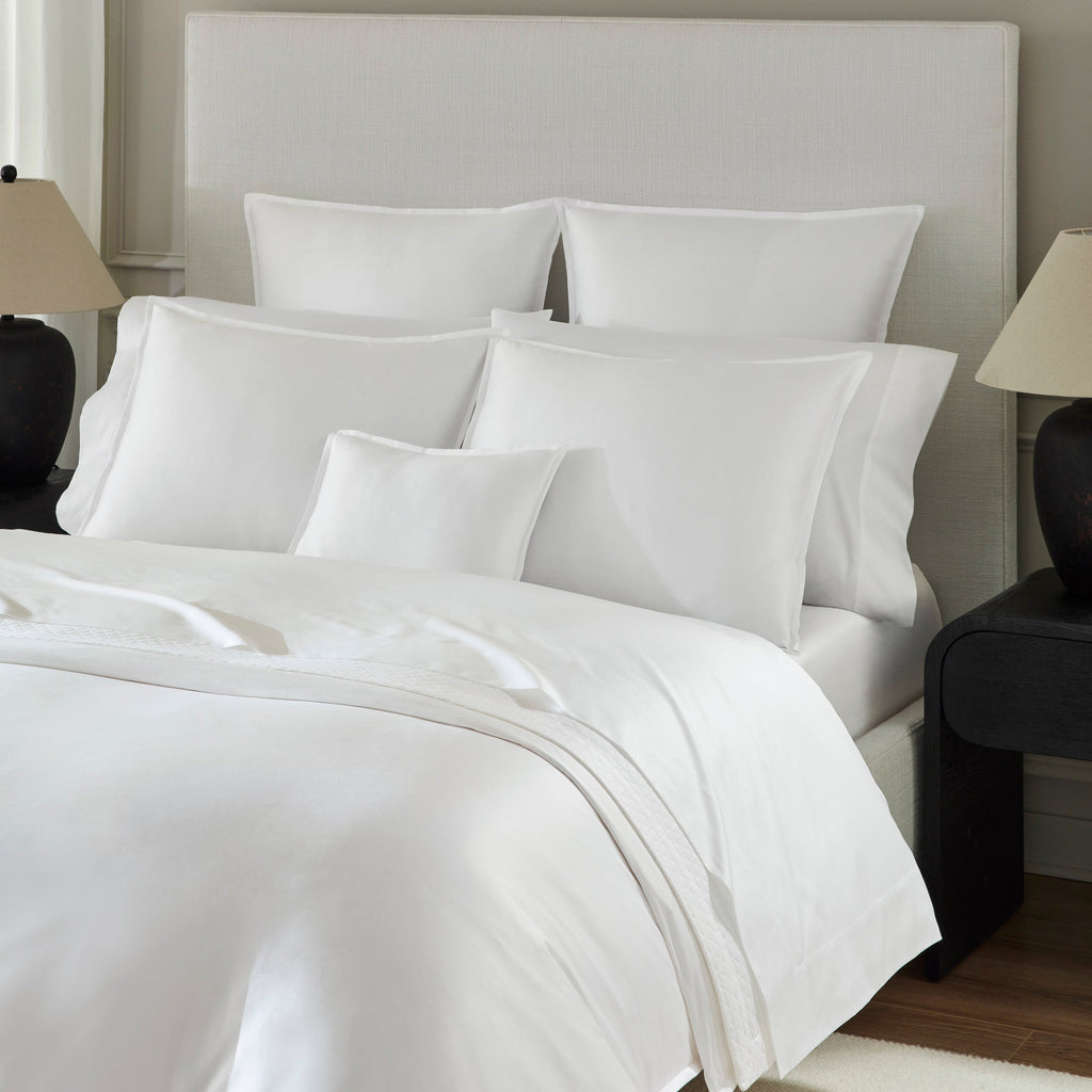 Giza 45 Corto Sateen Duvet Cover, Sheets, and Shams in White from luxury bedding designer Sferra Fine Linens