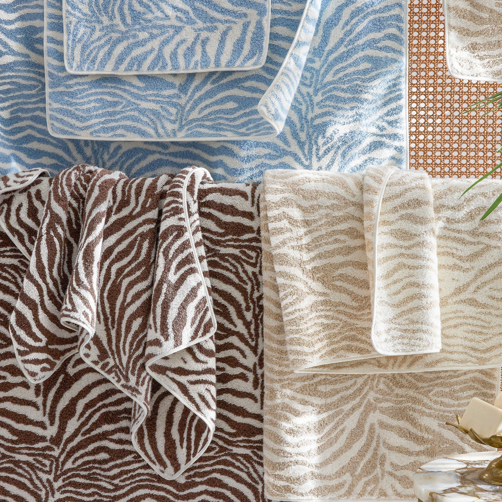 Matouk Regine Zebra Print Cotton Linen Blend Bath Towels in Hydrangea Blue, Sable Brown, and Sand