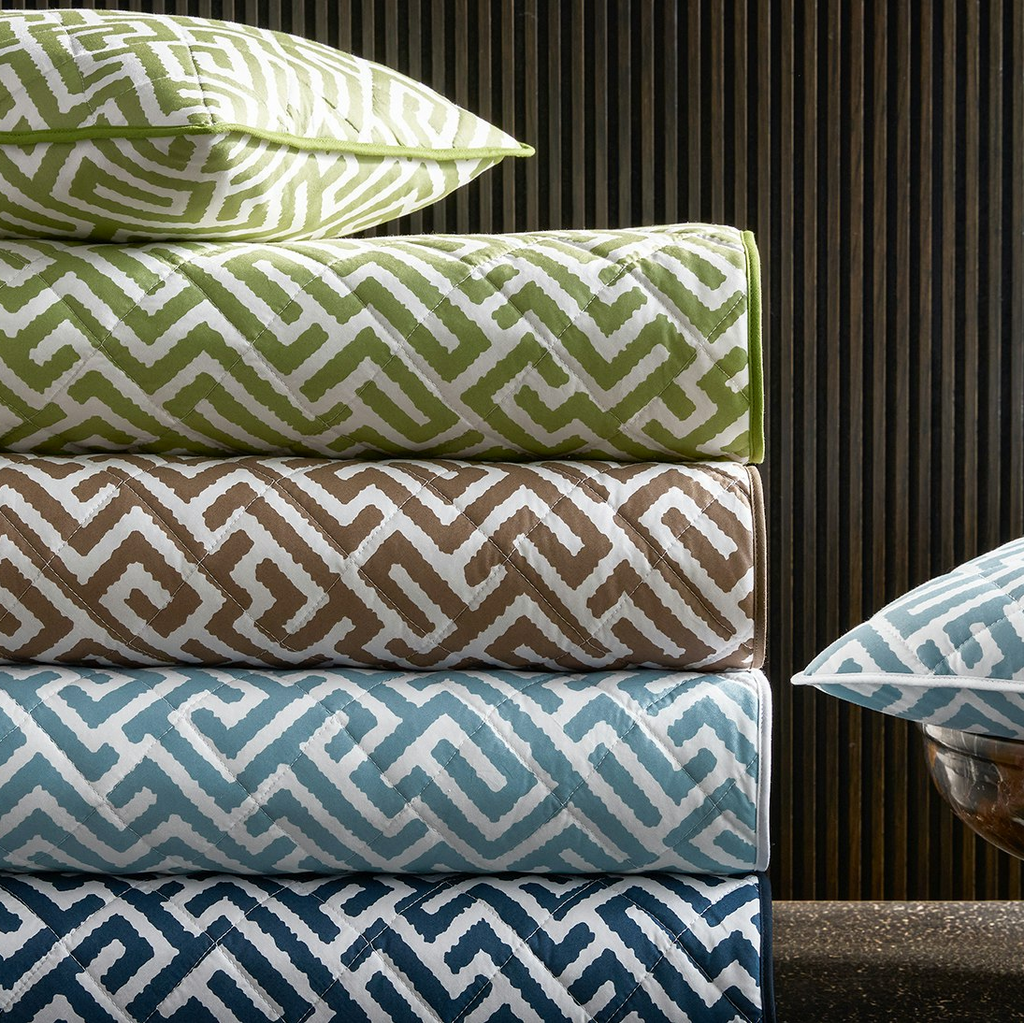 Matouk Schumacher Gabriel Geometric Printed Quilted Coverlets + Shams in Grass Green, Indigo Blue, Mocha Brown, and Stony Blue
