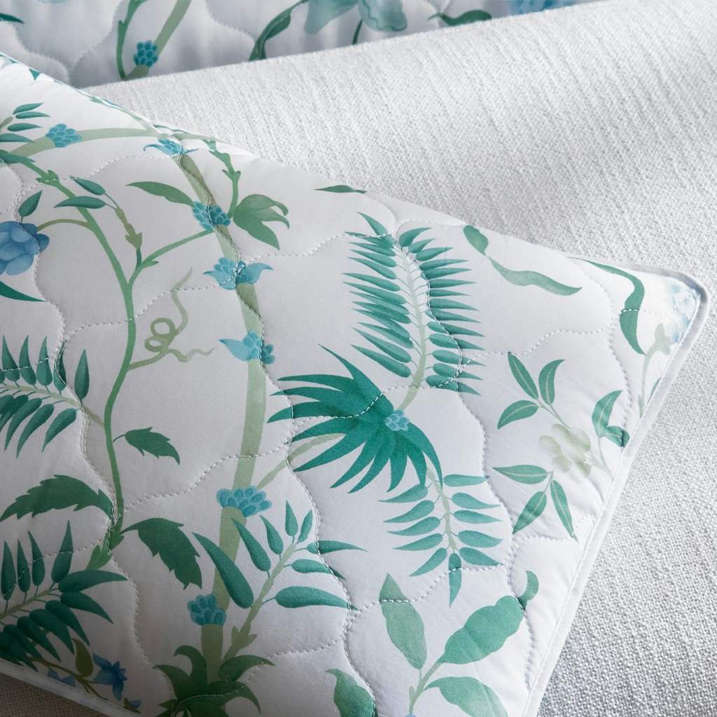 Matouk Schumacher Palmyra Palm Floral Print Quilted Coverlets + Shams in green blue hues