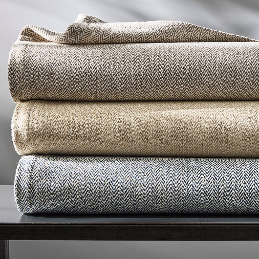 Matouk All Cotton Avalon Blanket with Chevron Pattern in Champagne, Platinum, and Navy