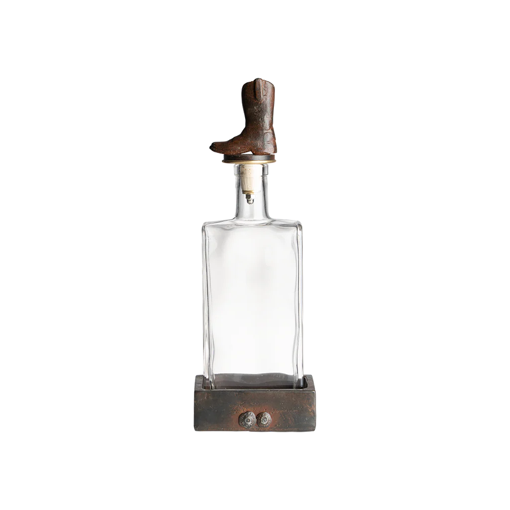 Jan Barboglio Wayne glass decanter with iron cowboy boot stopper