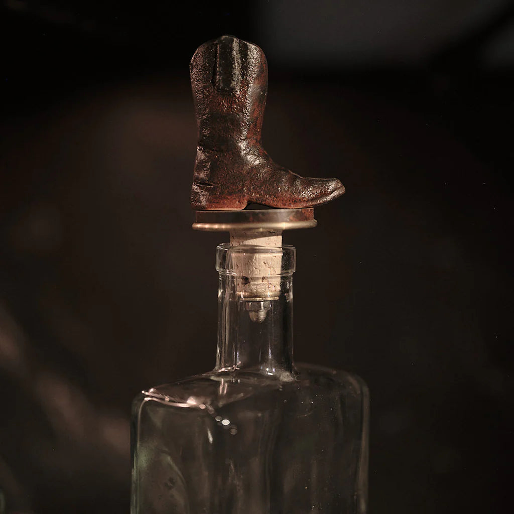 Jan Barboglio Wayne glass decanter with iron cowboy boot stopper