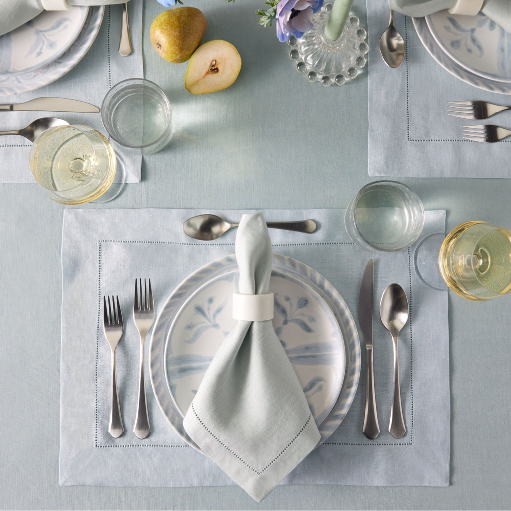 Sferra Festival Linen Placemats and Napkins with Hemstitch in Poolside Sky Blue