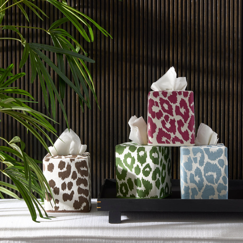 Four Iconic Leopard decorative tissue box covers with leopard print design in Cinder, Crimson, Green and Sky