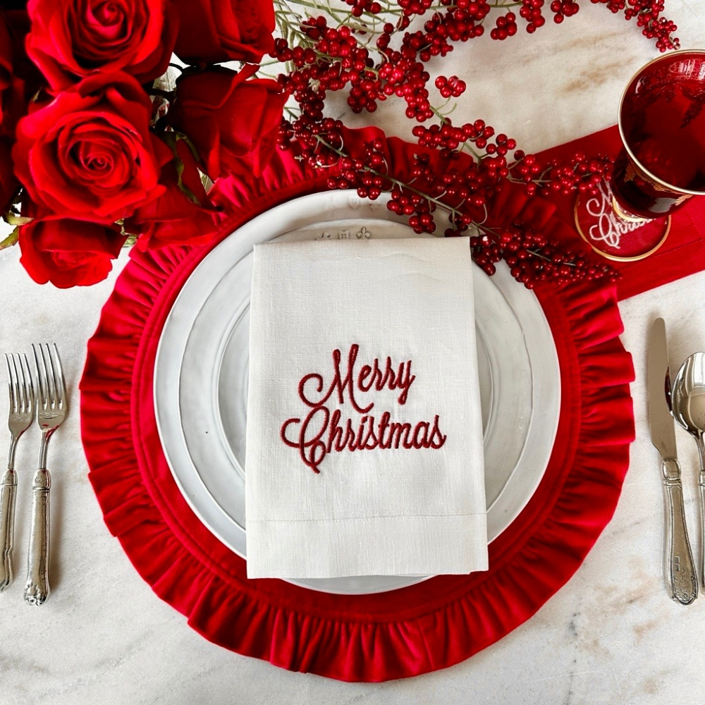 Arte Italica Merry Christmas Tri-Fold Napkin in White linen with red embroidered "Merry Christmas" in script font