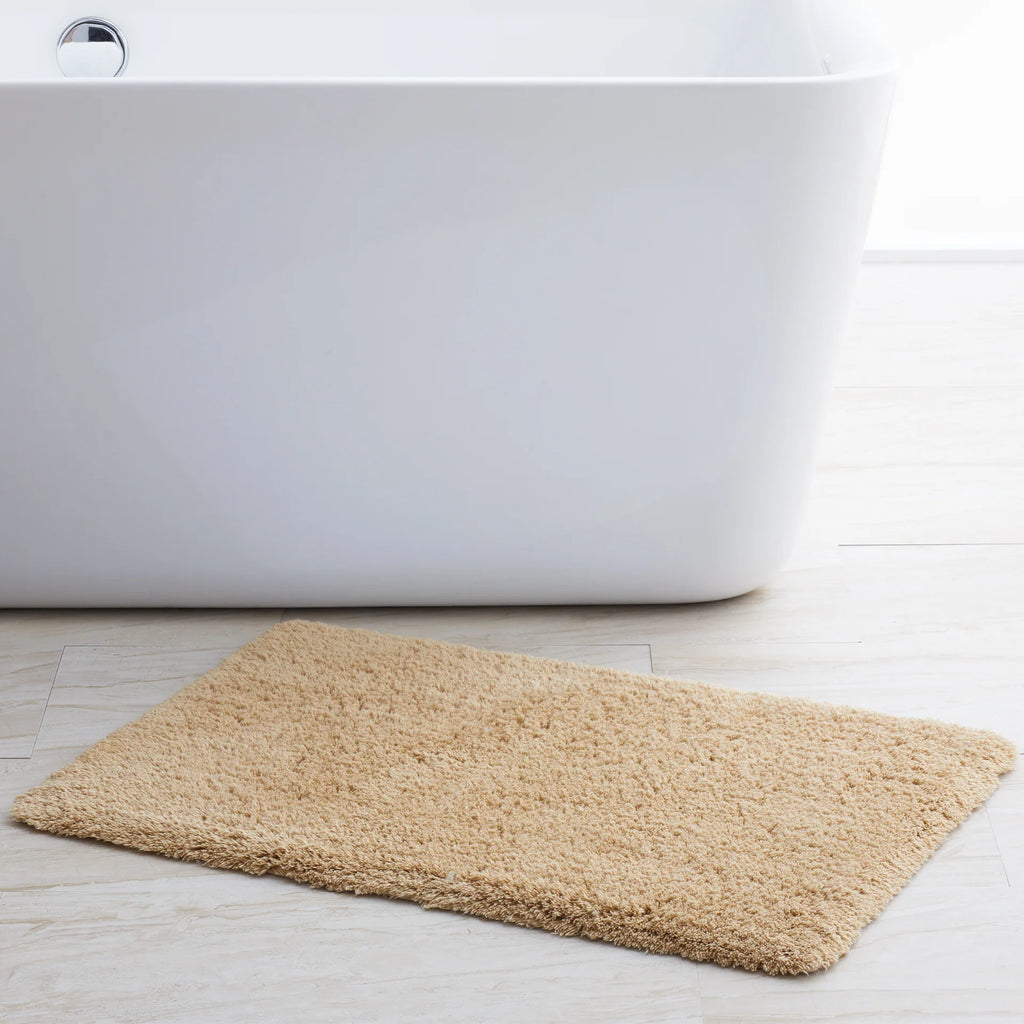 https://www.thepicketfence.com/cdn/shop/products/indulgence-bath-rugs-scandiahome-bronze-default-web_1024x1024.webp?v=1681934964